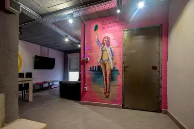 Una televisión o centro de entretenimiento en Apartamentos Nirvana y Averno