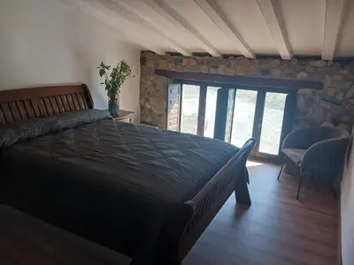 Cama o camas de una habitación en Casa rural los Cerezos