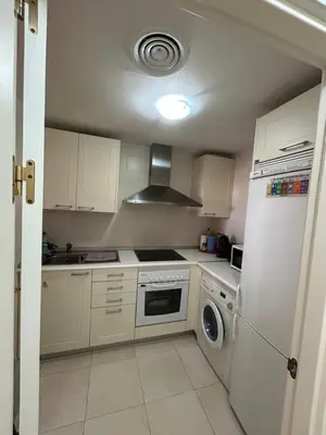 Una cocina o zona de cocina en Fabuloso apartamento en Marina de la Torre