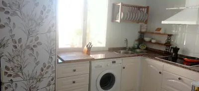 Una cocina o zona de cocina en Ático en terrazas de Garrucha con vistas al mar.