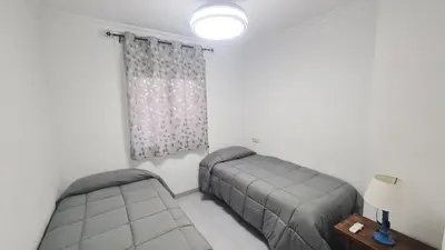 Cama o camas de una habitación en Ático en terrazas de Garrucha con vistas al mar.