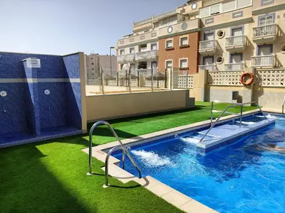 Piscina en o cerca de Ático en Roquetas de mar