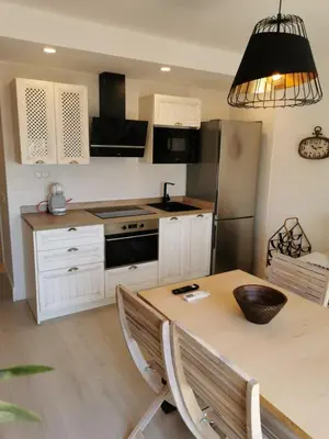 Una cocina o zona de cocina en Ático en Roquetas de mar