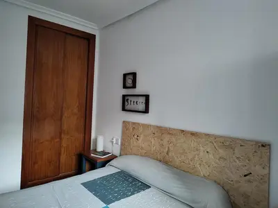 Cama o camas de una habitación en Vera Playa Apartamento muy cuco con jardín y 2 habitaciones