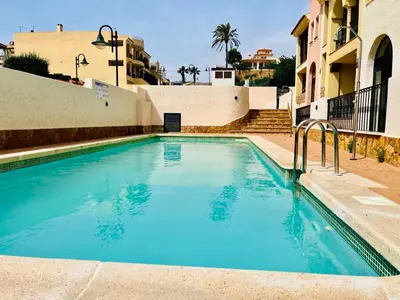 Piscina en o cerca de AquaHome- Precioso apartamento con piscina, 3 minutos a pie de Vera Playa