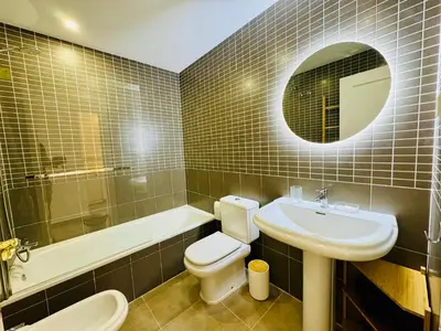 Un baño de AquaHome- Precioso apartamento con piscina, 3 minutos a pie de Vera Playa
