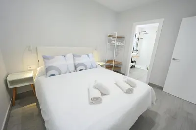 Cama o camas de una habitación en Paseo Marítimo - Apartamento a estrenar, a pie de playa, con 2 baños