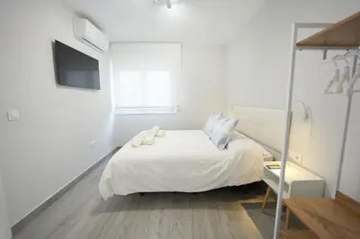 Cama o camas de una habitación en Paseo Marítimo - Apartamento a estrenar, a pie de playa, con 2 baños