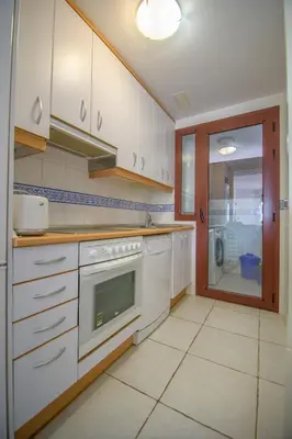 Una cocina o zona de cocina en Mediterranea 5 Vera Playa Jardines tus momentos frente al mar