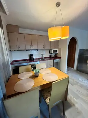 Una cocina o zona de cocina en Apartamento Verano Azul