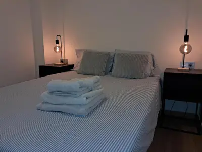 Cama o camas de una habitación en Apartamento Playa Paseo Marítimo Almería