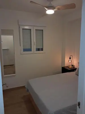 Cama o camas de una habitación en Apartamento Playa Paseo Marítimo Almería