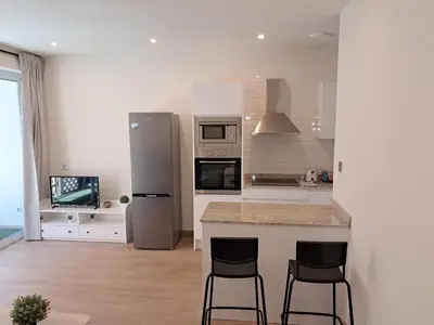 Una cocina o zona de cocina en Apartamento Playa Paseo Marítimo Almería