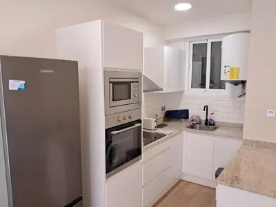 Una cocina o zona de cocina en Apartamento Playa Paseo Marítimo Almería