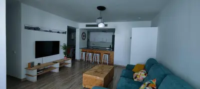 Una televisión o centro de entretenimiento en Apartamento El dragoncillo del Cabo