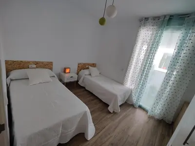 Cama o camas de una habitación en Apartamento El dragoncillo del Cabo