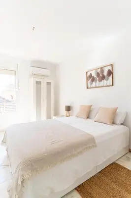 Cama o camas de una habitación en TrendyHomes San Sebastián