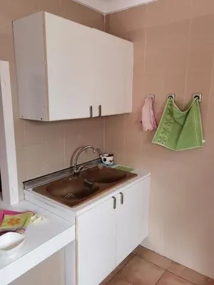 Una cocina o zona de cocina en Apartamento El Palmeral 1ª línea