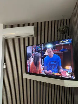 Una televisión o centro de entretenimiento en Villa playa