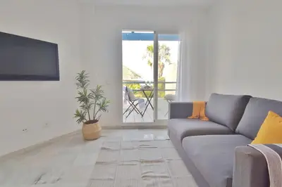 Una televisión o centro de entretenimiento en Sol y Luz