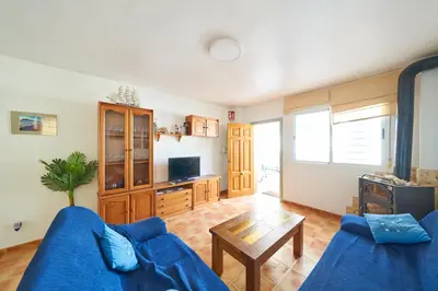 Una televisión o centro de entretenimiento en Casa Juani