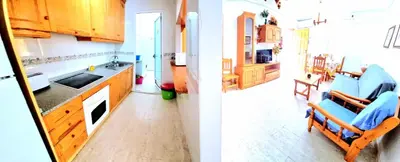 Una cocina o zona de cocina en Bajo VERAMAR 1 frente a parque 2 dormitorios 500 metros de la playa