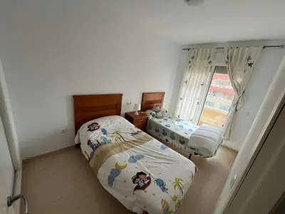 Cama o camas de una habitación en Aguadulce SOL y PLAYA- A/C