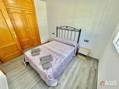Cama o camas de una habitación en Apartamaento Asis A