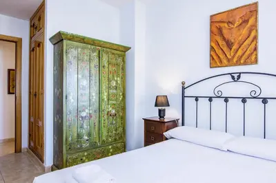 Cama o camas de una habitación en Águilas Delicias Piscina Wifi AC Parking Gratis