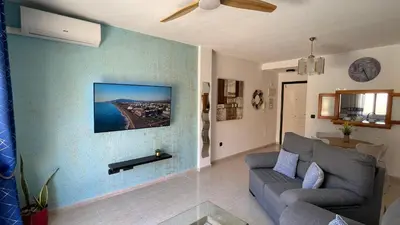 Una televisión o centro de entretenimiento en CASA EVA Naturista, Vera Playa