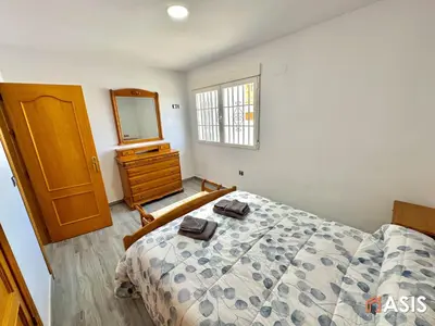 Cama o camas de una habitación en Apartamento asis B