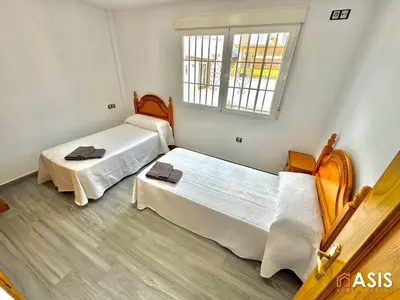 Cama o camas de una habitación en Apartamento asis B
