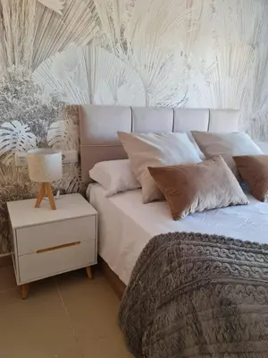Cama o camas de una habitación en Sybarix Beach: 1ª línea de playa