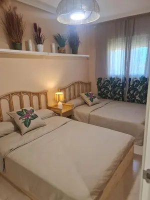 Cama o camas de una habitación en Villa Romana con piscina privada y vistas al jardín