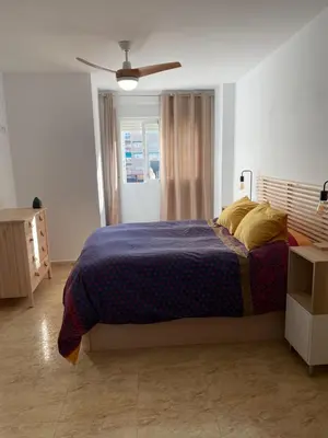 Cama o camas de una habitación en Piso con plaza garaje