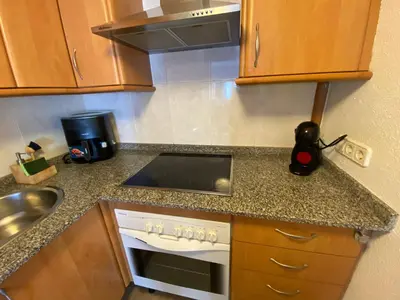 Una cocina o zona de cocina en Apartamento Centro Aguamarga