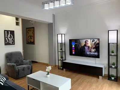 Una televisión o centro de entretenimiento en Apartamento CostaSol