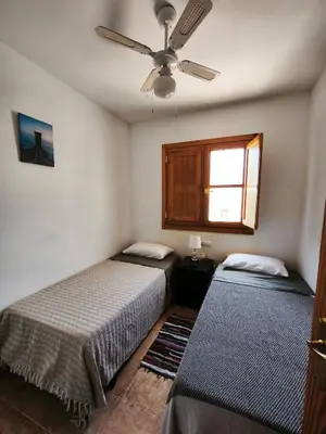 Cama o camas de una habitación en El mirador del beregenal