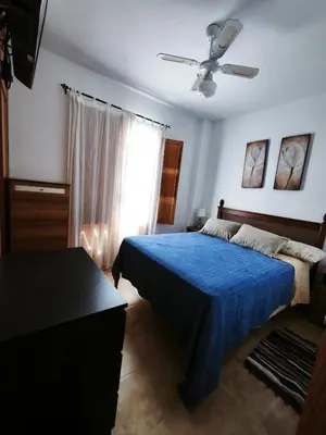 Cama o camas de una habitación en El mirador del beregenal