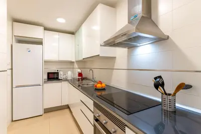 Una cocina o zona de cocina en Apartamento Mirador Playa Serena II R&R