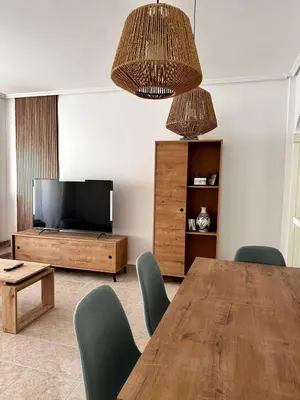 Una televisión o centro de entretenimiento en Alojamiento en Aguadulce 1