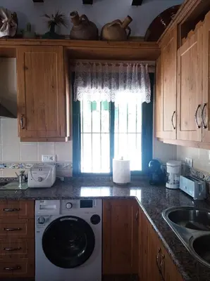 Una cocina o zona de cocina en Cortijo El Pilón