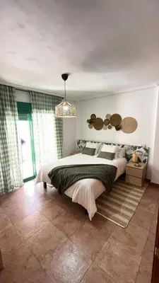 Cama o camas de una habitación en Rinconcito de Mar y Relax