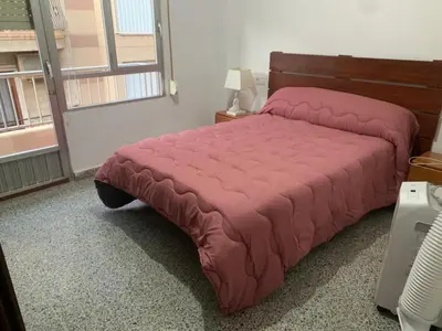 Cama o camas de una habitación en Piso céntrico