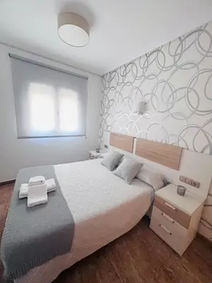 Cama o camas de una habitación en PENSION NAVAS