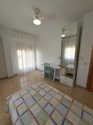 Cama o camas de una habitación en Piso cerca playa Almeria