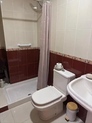 Un baño de Apartamento céntrico junto paseo, playas y zonas de interés!!