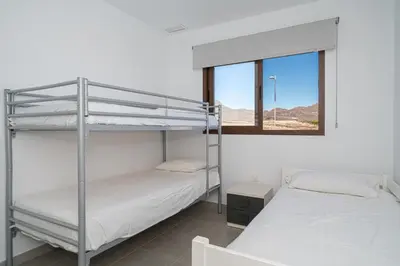 Cama o camas de una habitación en Rumba