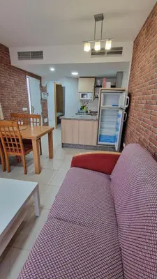 Una cocina o zona de cocina en Alojamiento con terraza 1B02 en la Playa de Vera.