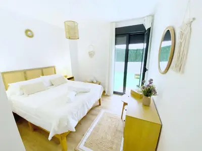 Cama o camas de una habitación en Casa del Mar luxury. Primera linea de playa